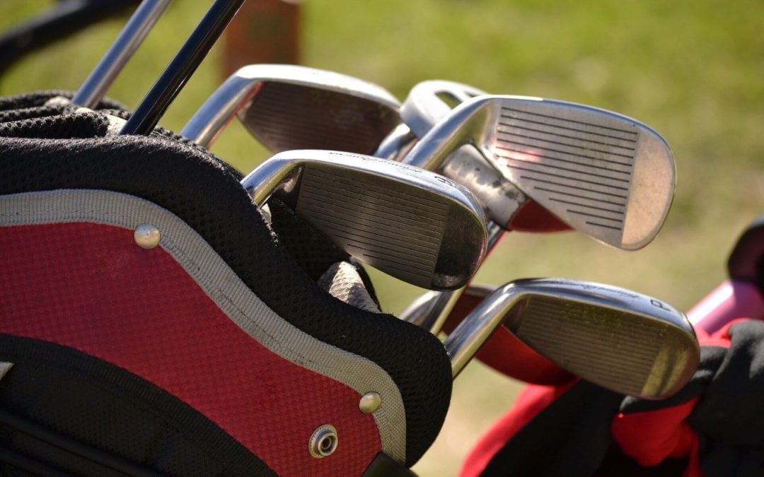 close up of golf clubs