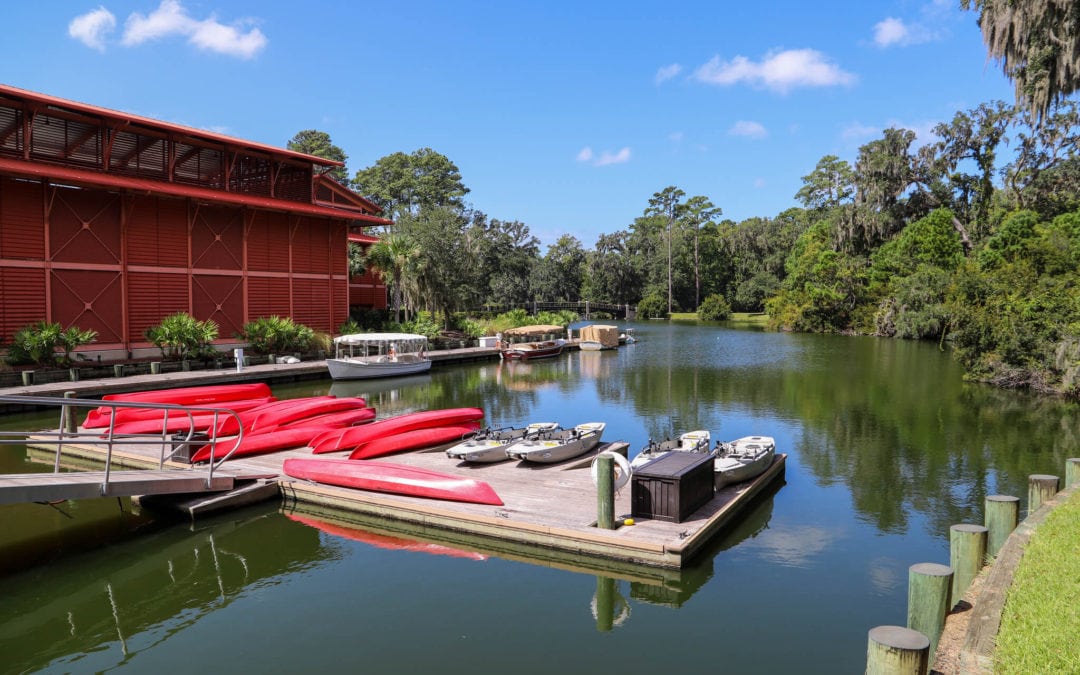 Dock with red kayaks